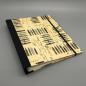 Preview: Ringbuch Planer A5 schwarz beige Gummiband Front